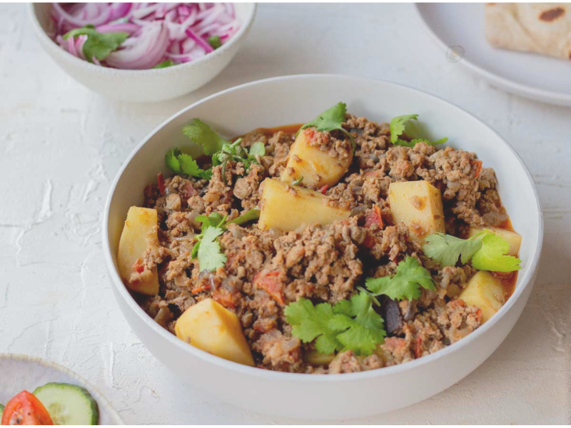 Homemade aloo keema stored in freezer-safe containers for easy meal prep